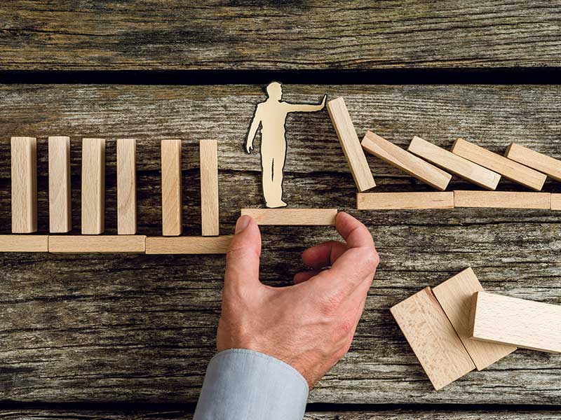 Wooden dominos falling