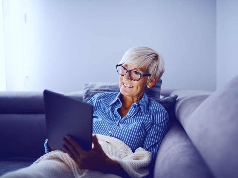 mature woman with tablet