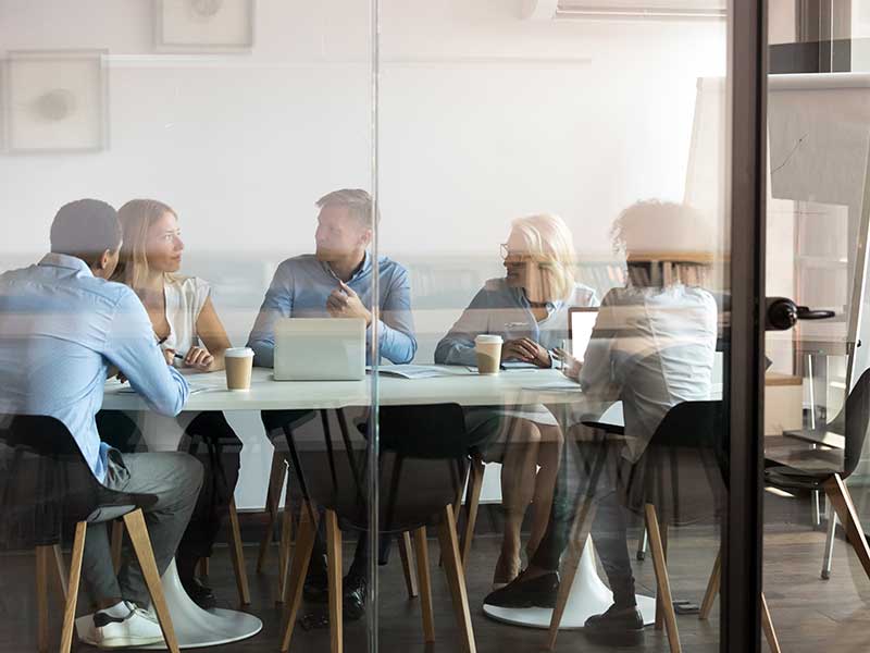 Diverse group of coworkers meeting