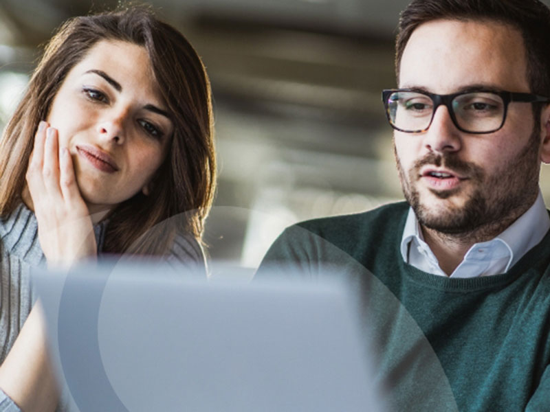 Couple reviewing portfolio