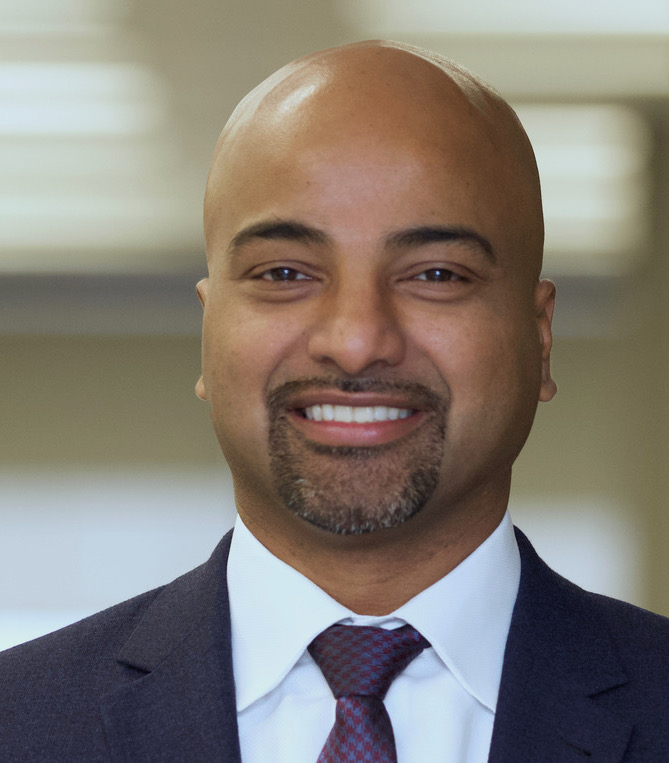 Headshot of Vim Thasan