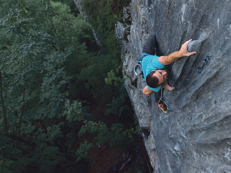 man rock climbing