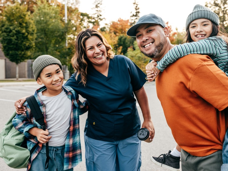 Young family in a parking lot