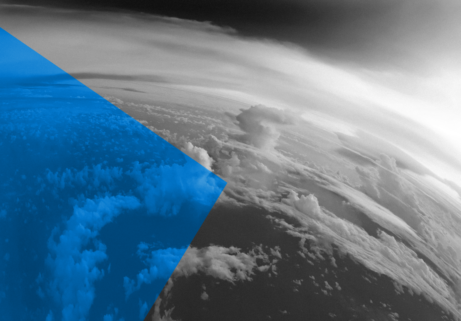 Aerial view of Planet Earth with clouds, horizon and little bit of space